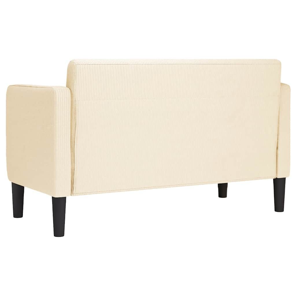 Cord Sofa in Creme im Wohnzimmer