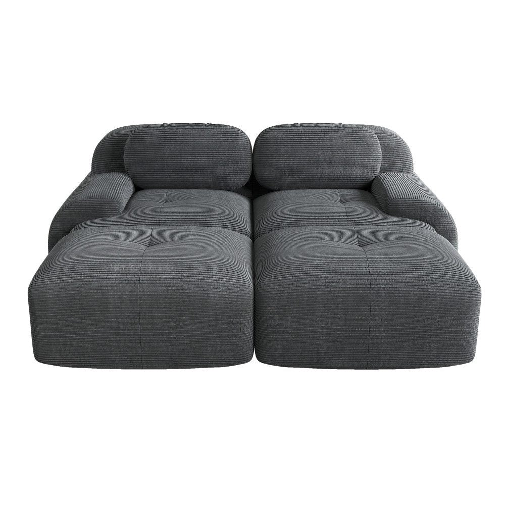 Cord Sofa in Grau von schräg vorn
