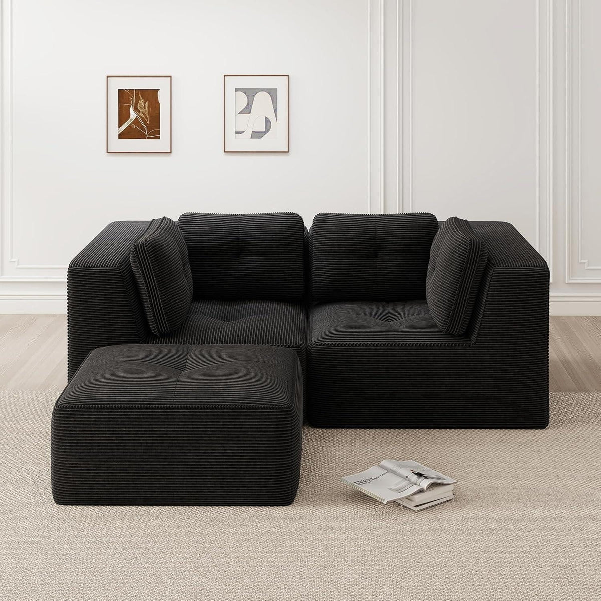 Schwarzes Cord Ecksofa mit tiefer Sitzfläche seitlich