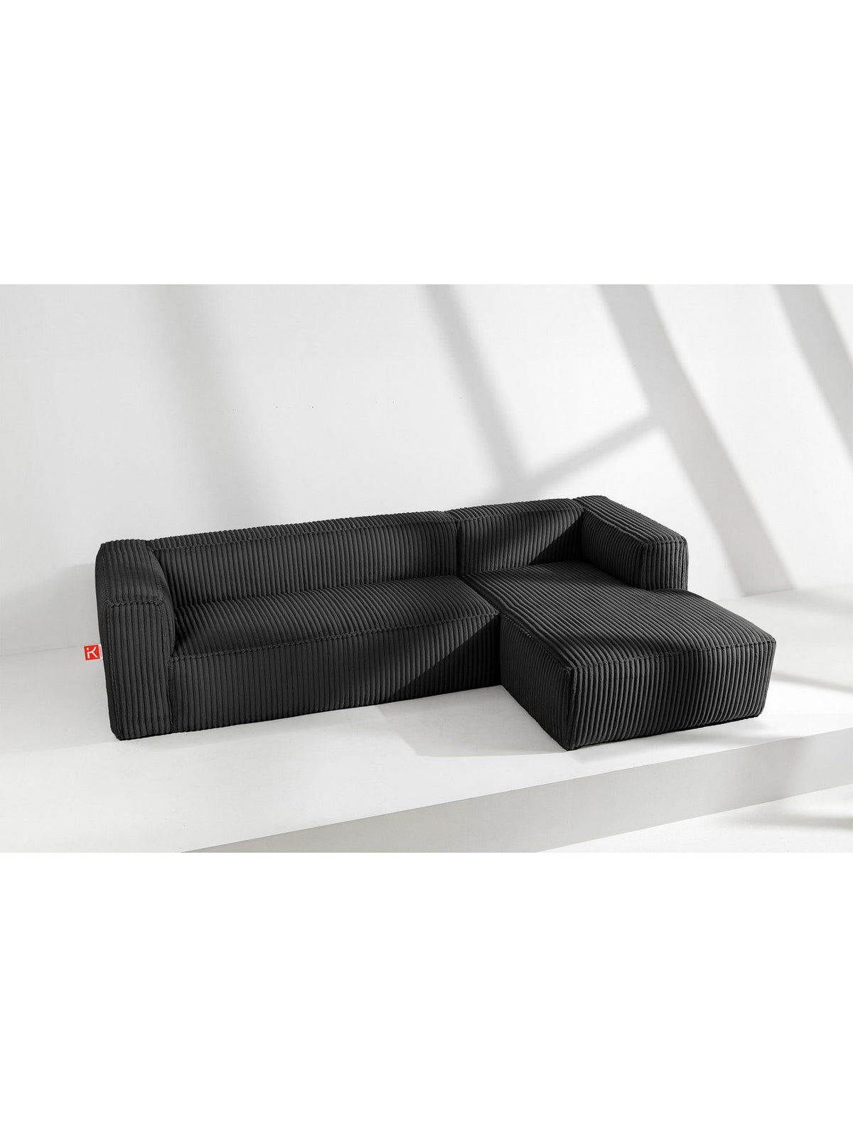 Kunststoffgleiter und Armlehne des Ecksofas FEROX