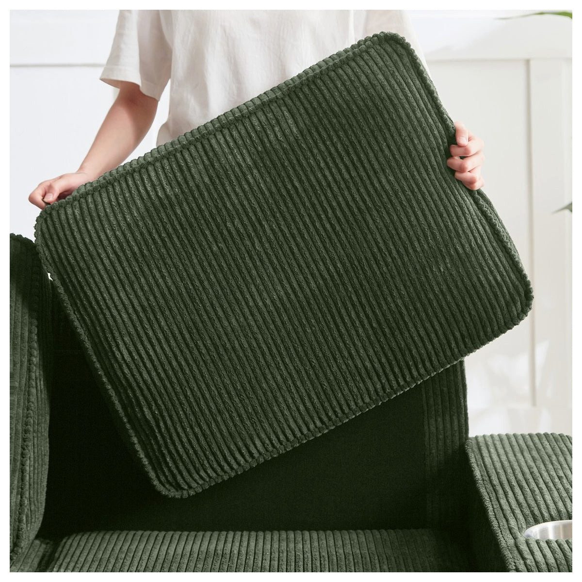 Rückansicht des grünen Cord Sofas