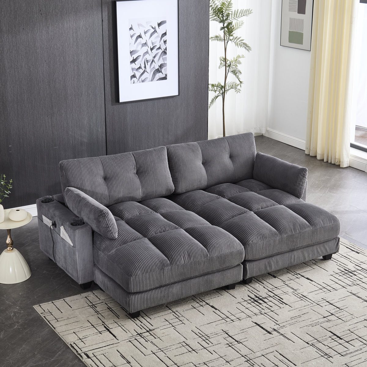 Cord Loungesofa in Grau von vorne im Wohnzimmer