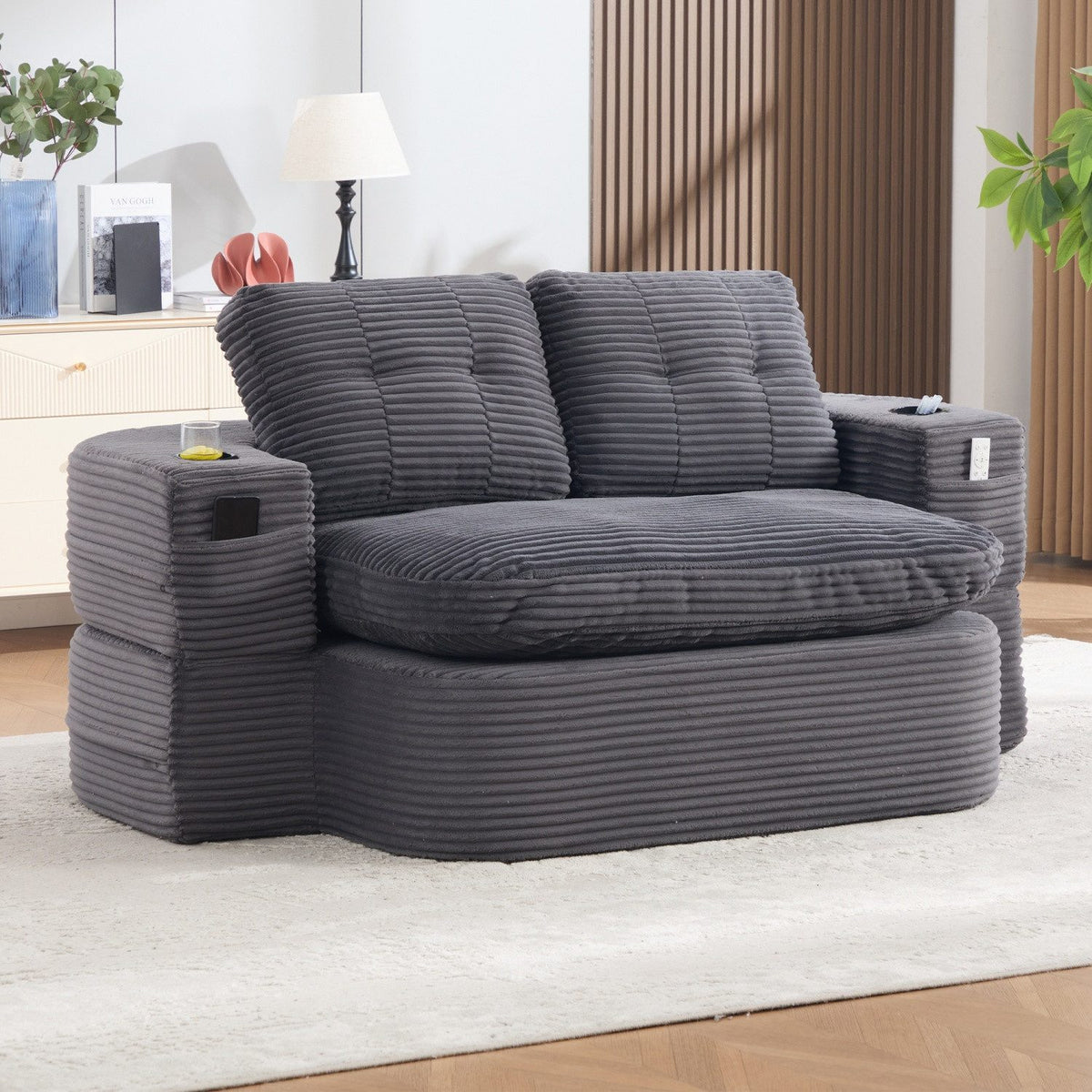 Dunkelgraues Cord Schlafsofa in der Seitenansicht