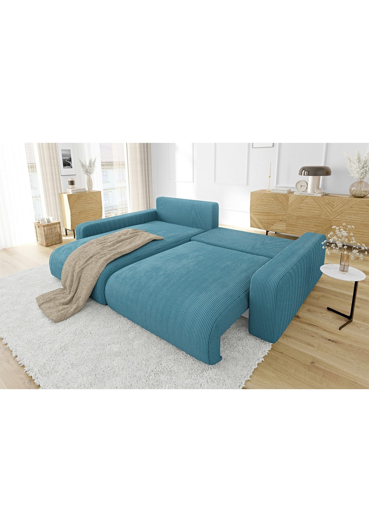 Cord Ecksofa EMMA in Türkis von vorne im Wohnzimmer