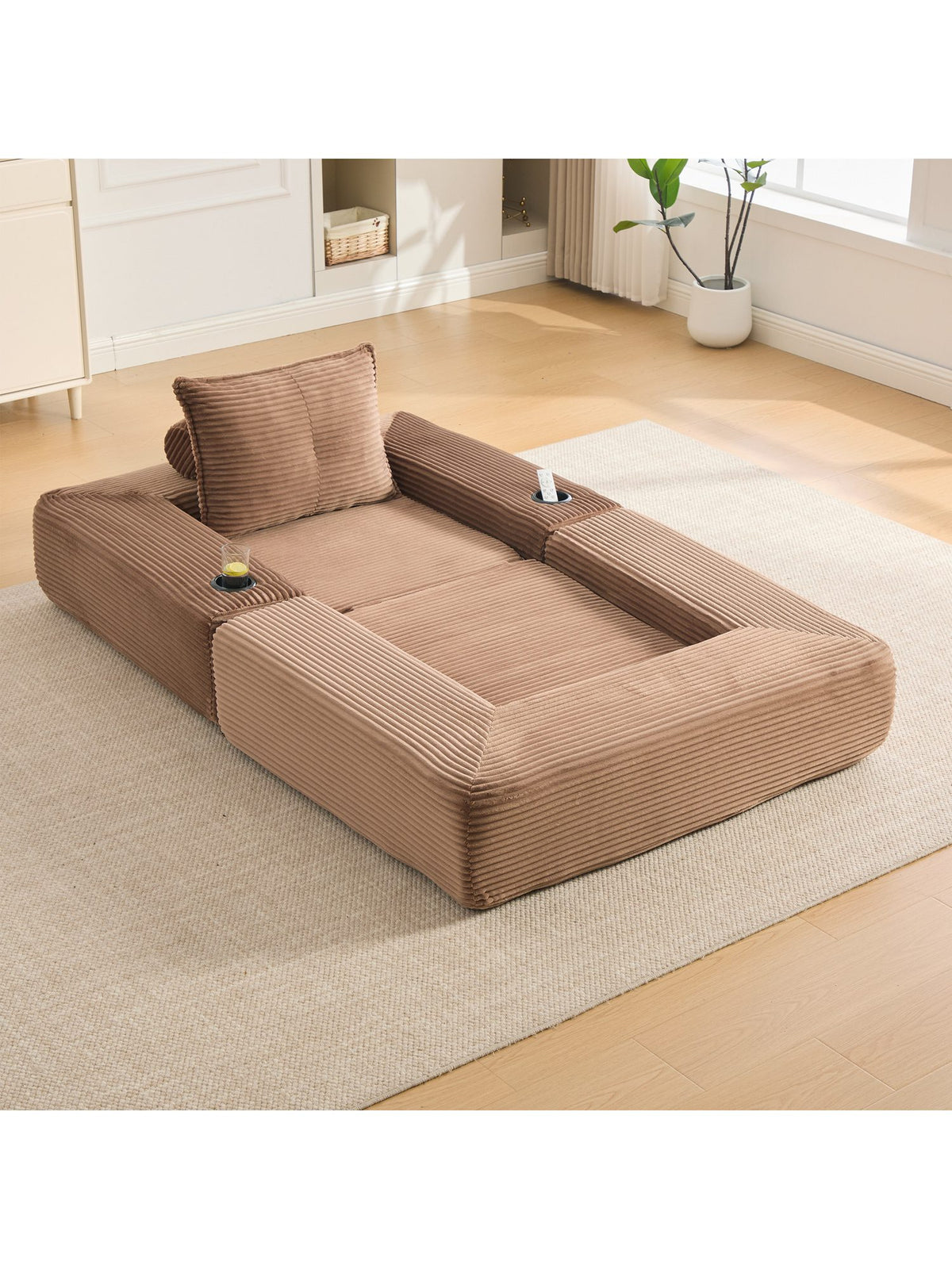 Cord Klappsofa in Braun im Wohnzimmer Ambiente