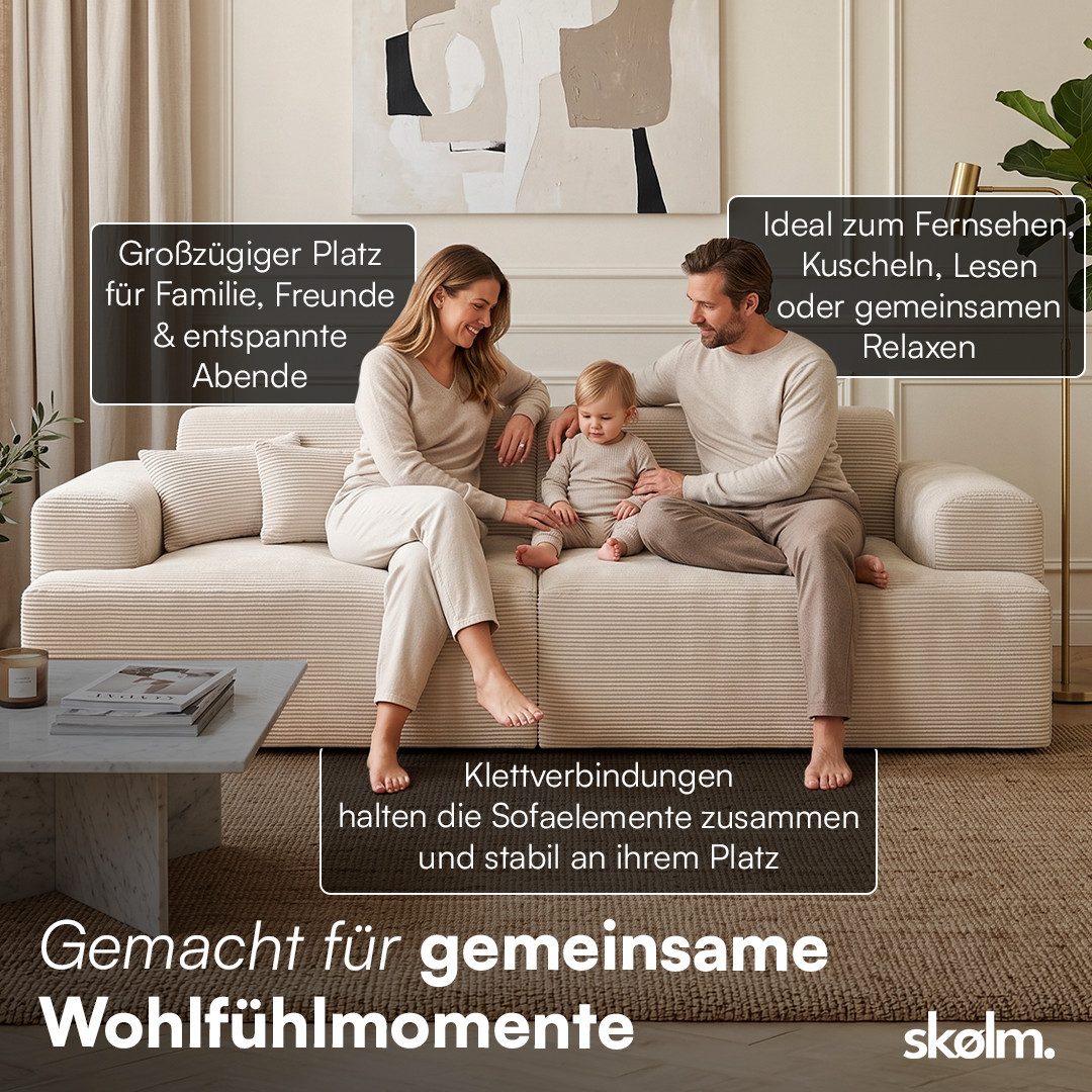 Seitenansicht des Cordsofas FREKI mit geschwungener Armlehne