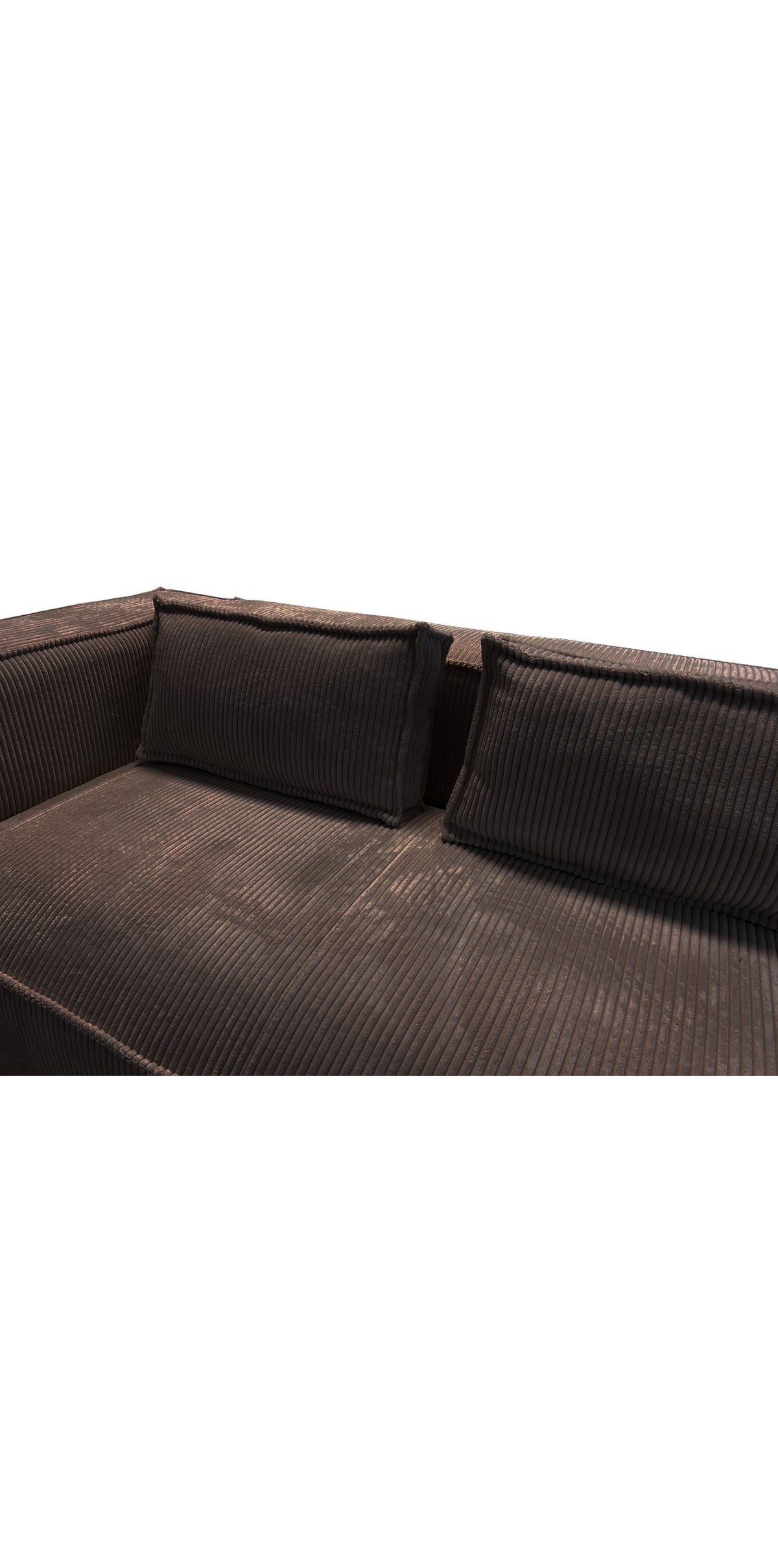 Nahaufnahme des dunkelbraunen Cord-Stoffs am Sofa RENNE