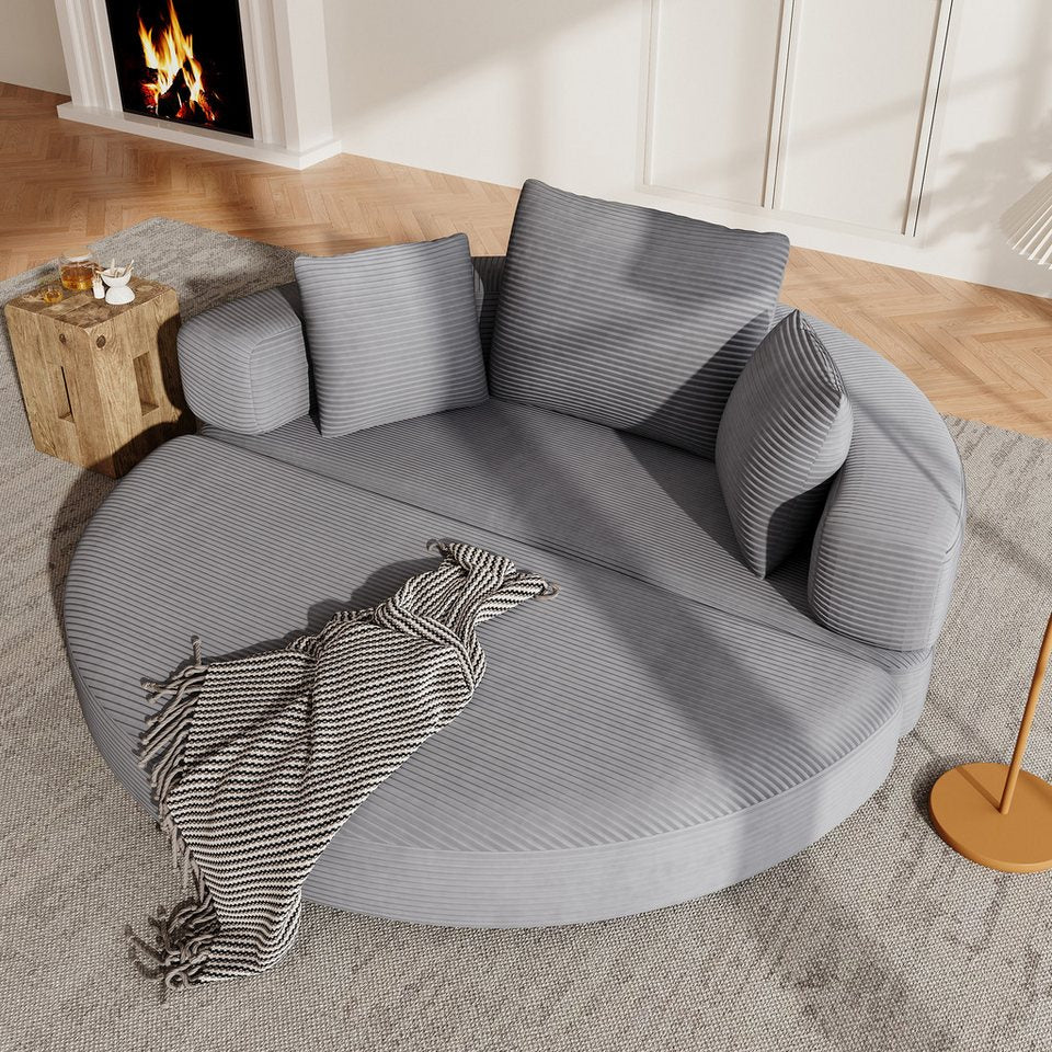 Cord Schlafsofa in Grau mit Hocker und drei Kissen