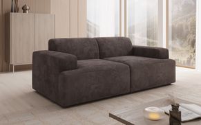 Breite Armlehnen und weiche Polster des Cord Sofas MONZA