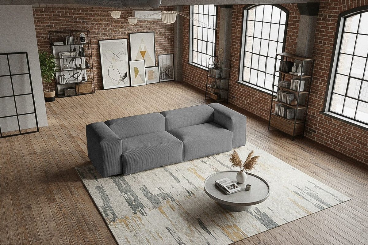 Seitenansicht des Cord Sofas CELESTE in Grau