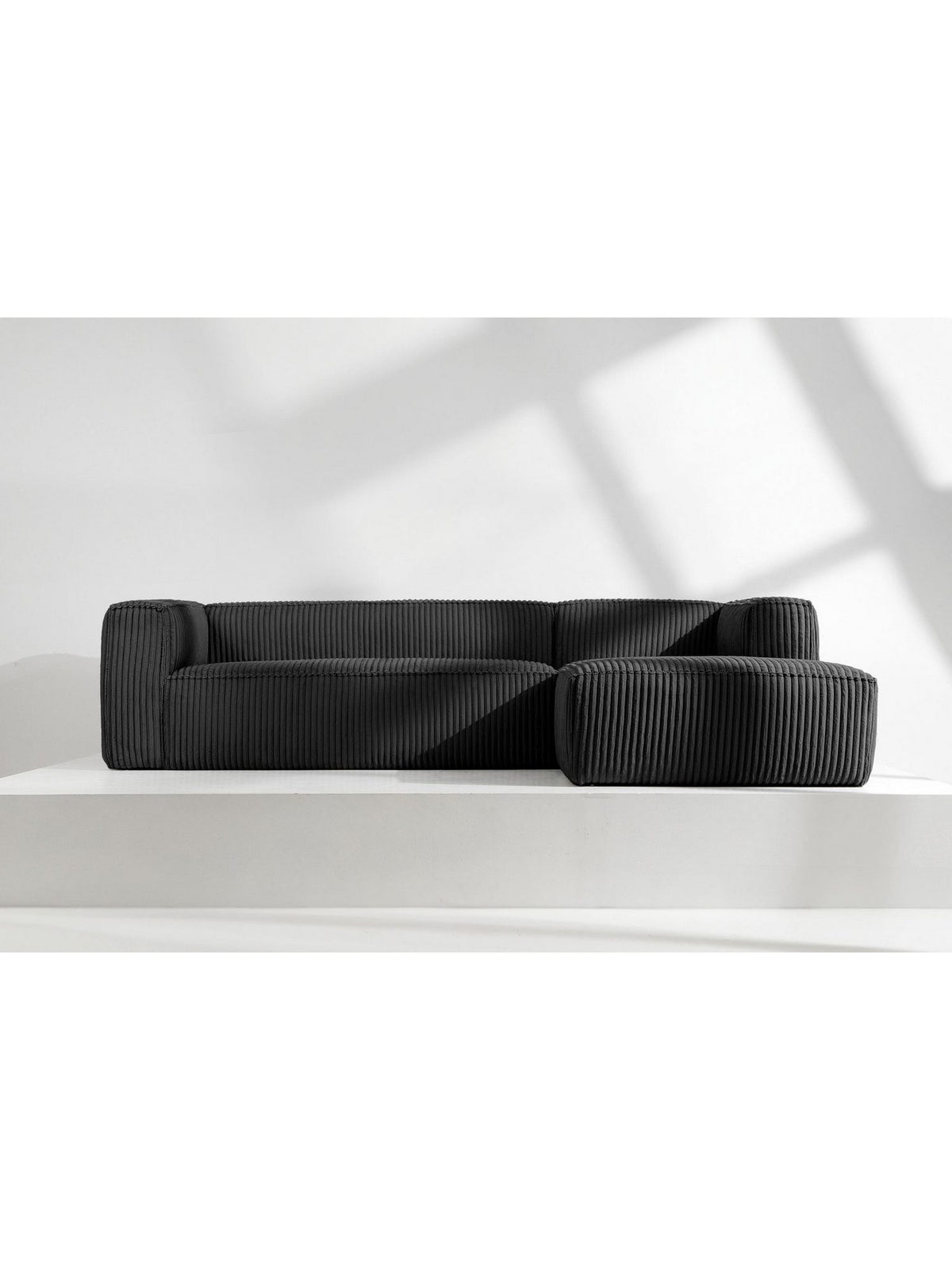 Eckelement des Cord Ecksofas FEROX von vorne