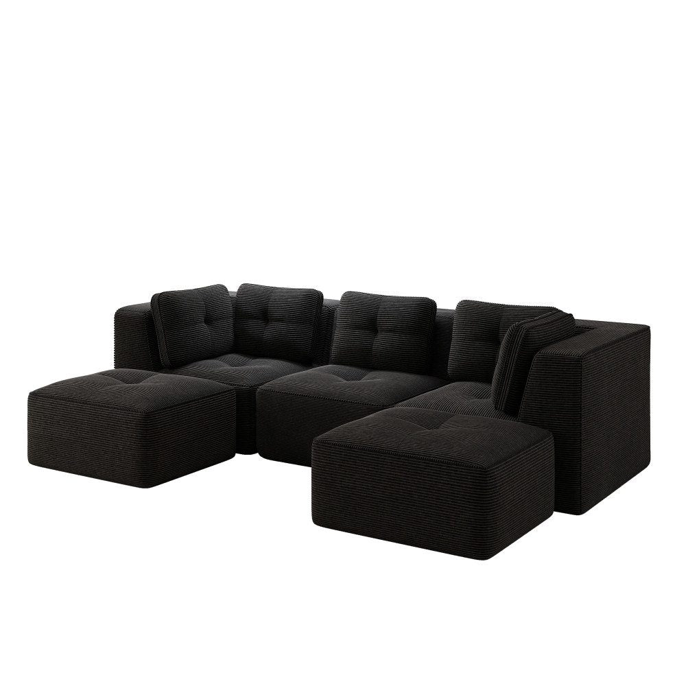 Breite Armlehnen und Cordstruktur des schwarzen Sofas