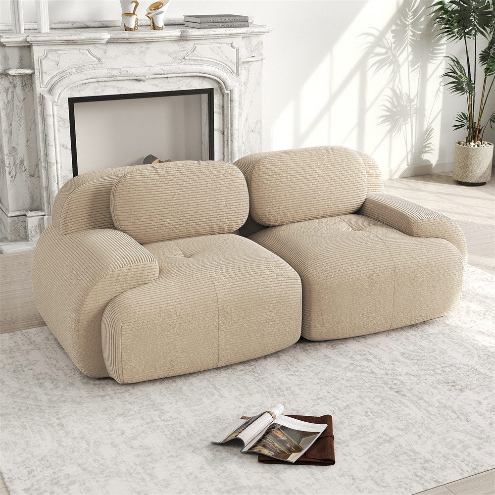 Geschwungene Armlehne des Cord Sofas