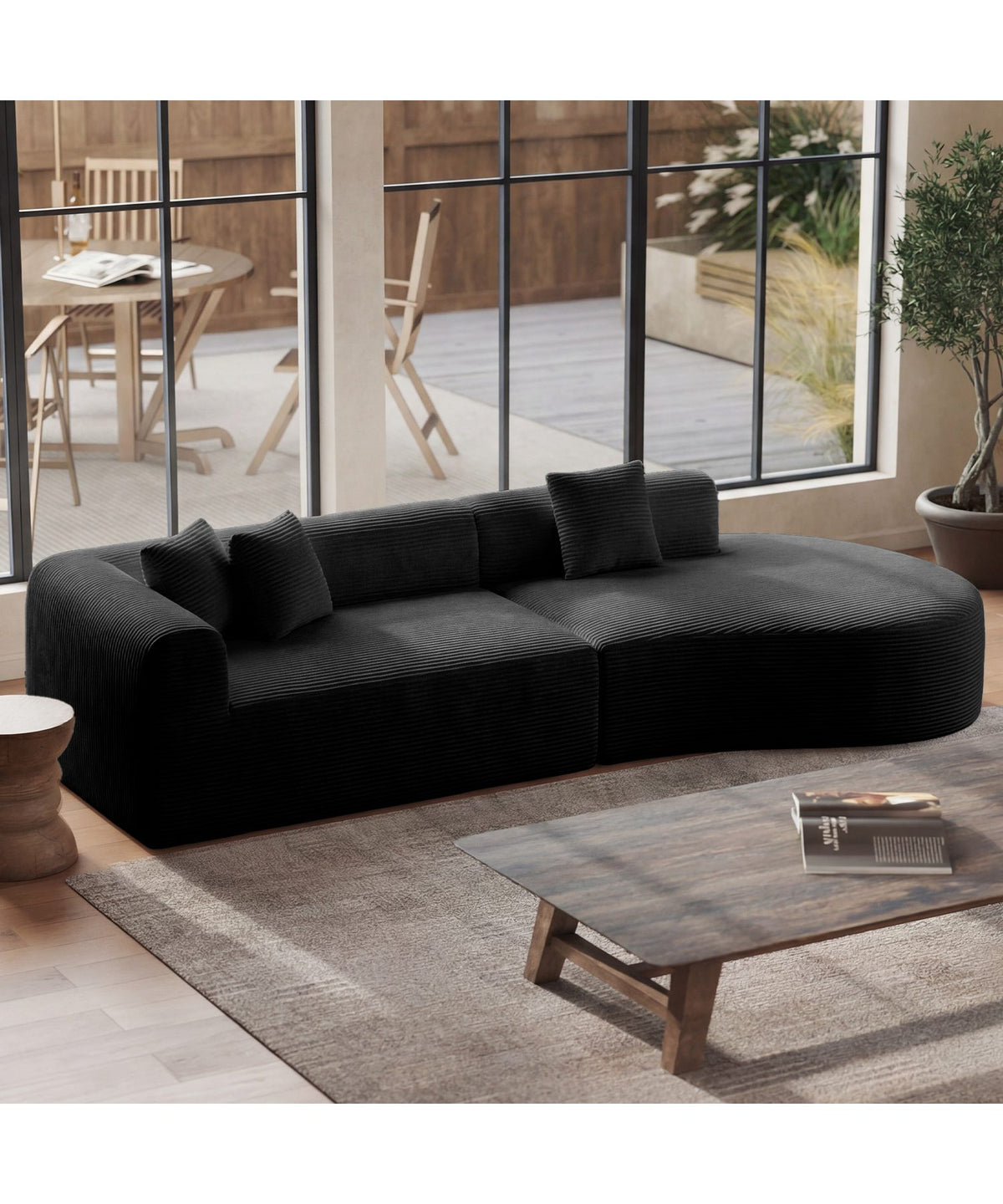 Schwarzes Cord Ecksofa in L-Form von vorne