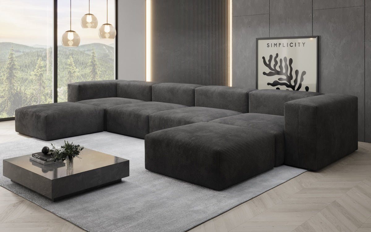 Cord Wohnlandschaft SNUG U in Schwarz im Wohnraum gestellt