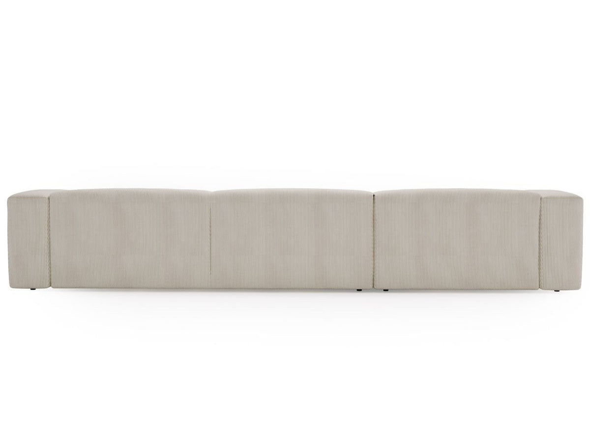 Cord Ecksofa LANDI U in Beige im Wohnzimmer aufgestellt
