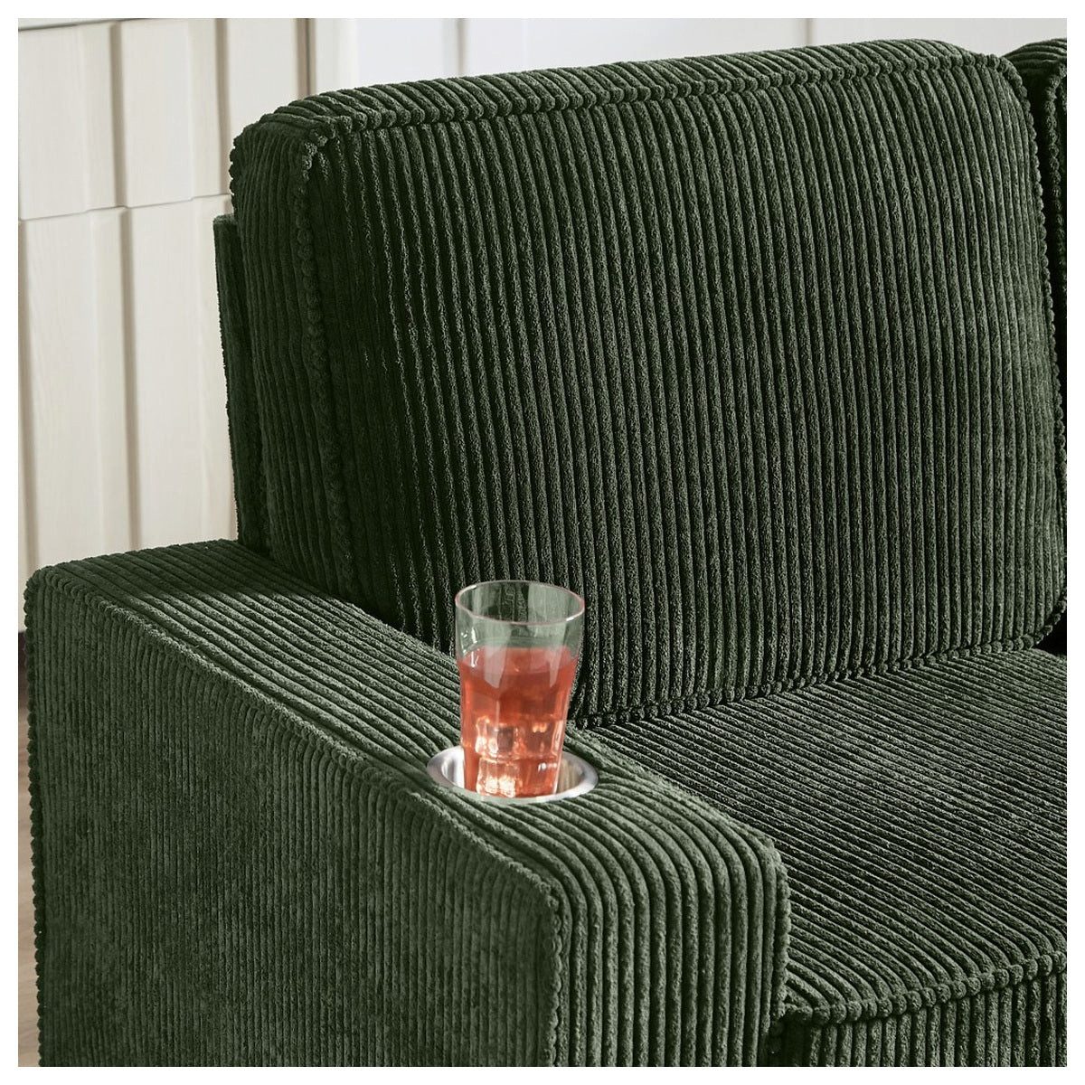 Sitzfläche des grünen Cord Sofas