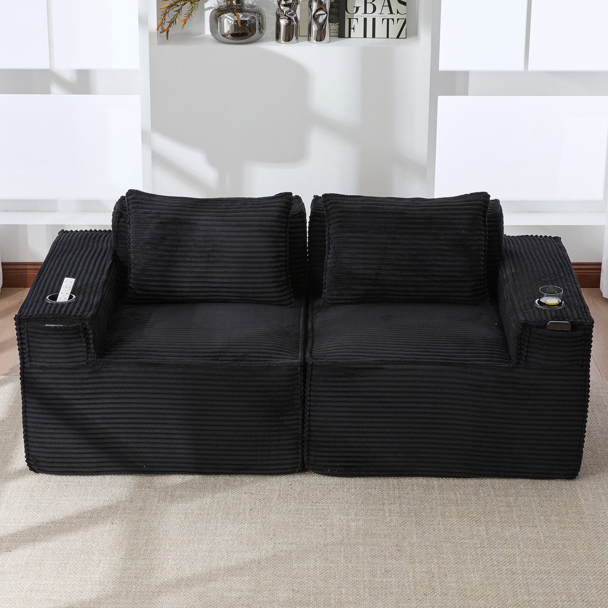 Modulares schwarzes Cord Sofa von vorne
