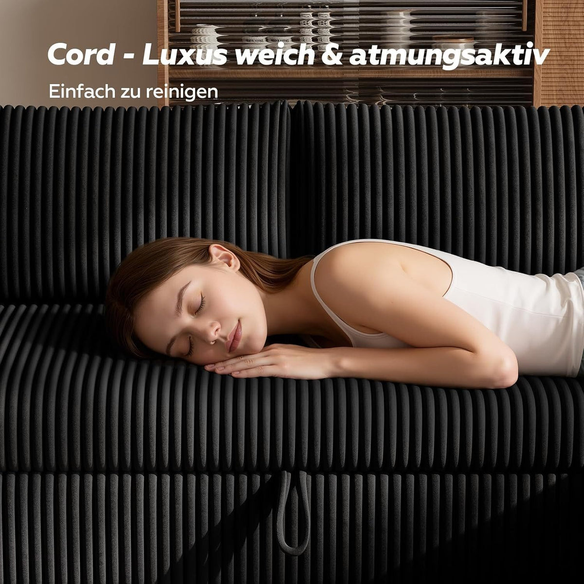 Ausgezogene Schlaffunktion des schwarzen Cord Ecksofas