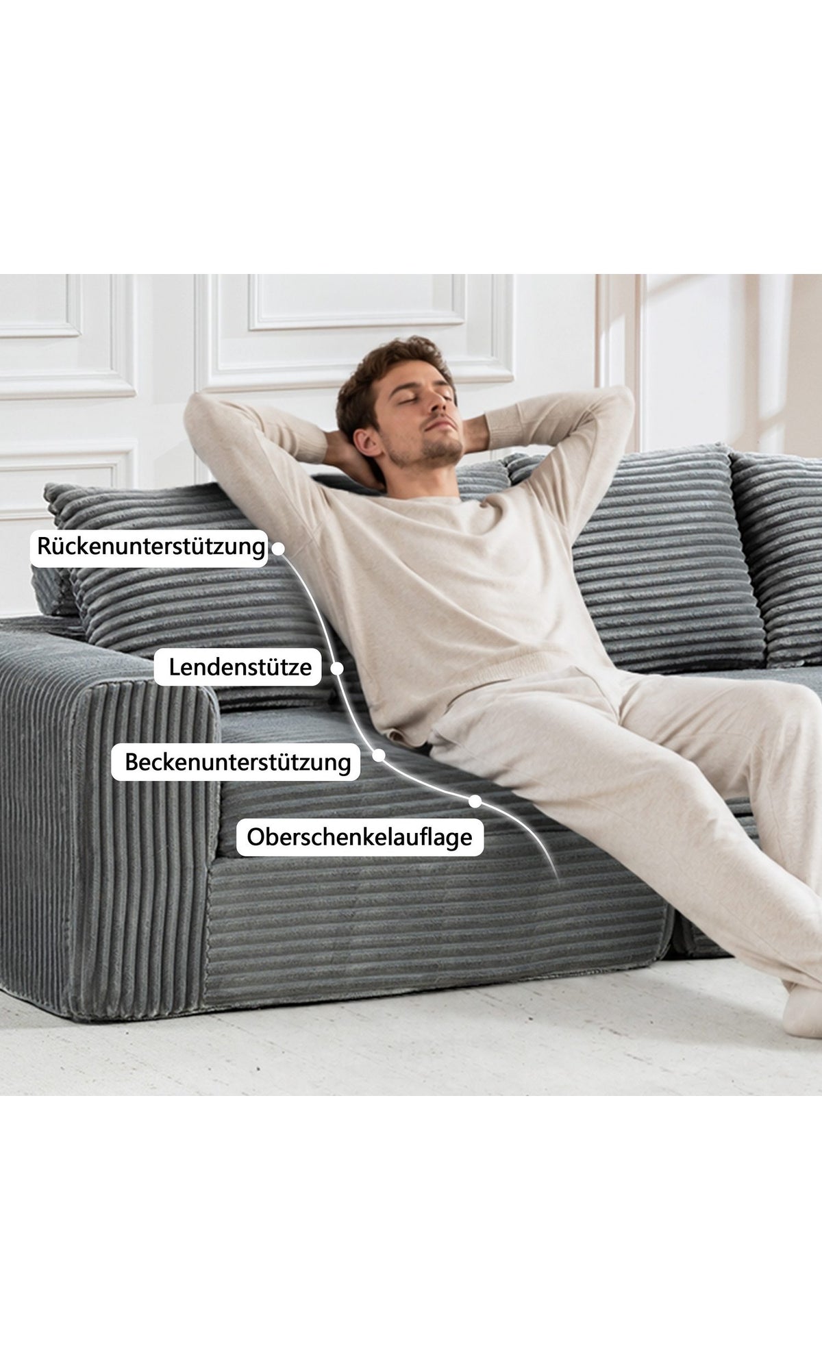 Detail der breiten Armlehne des grauen Cord Ecksofas