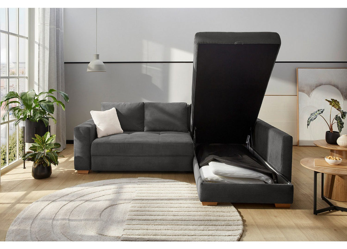Cord Ecksofa mit umgeklappter Rückenlehne als Liegefläche