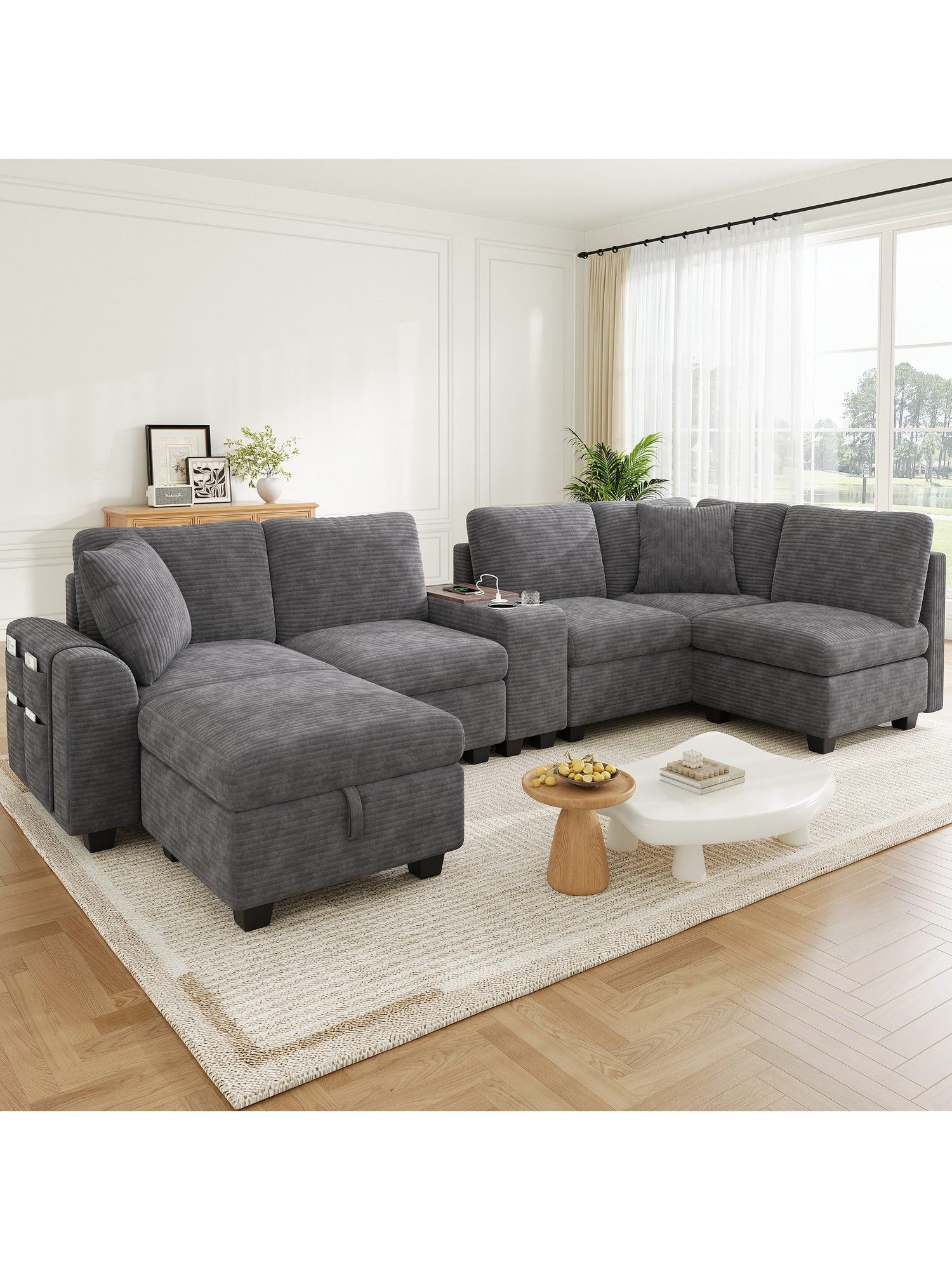 Graue Cord Wohnlandschaft mit Ottomane im Wohnzimmer