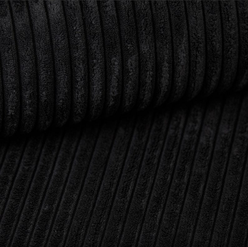 Cord Wohnlandschaft SIENA in Schwarz im Wohnraum
