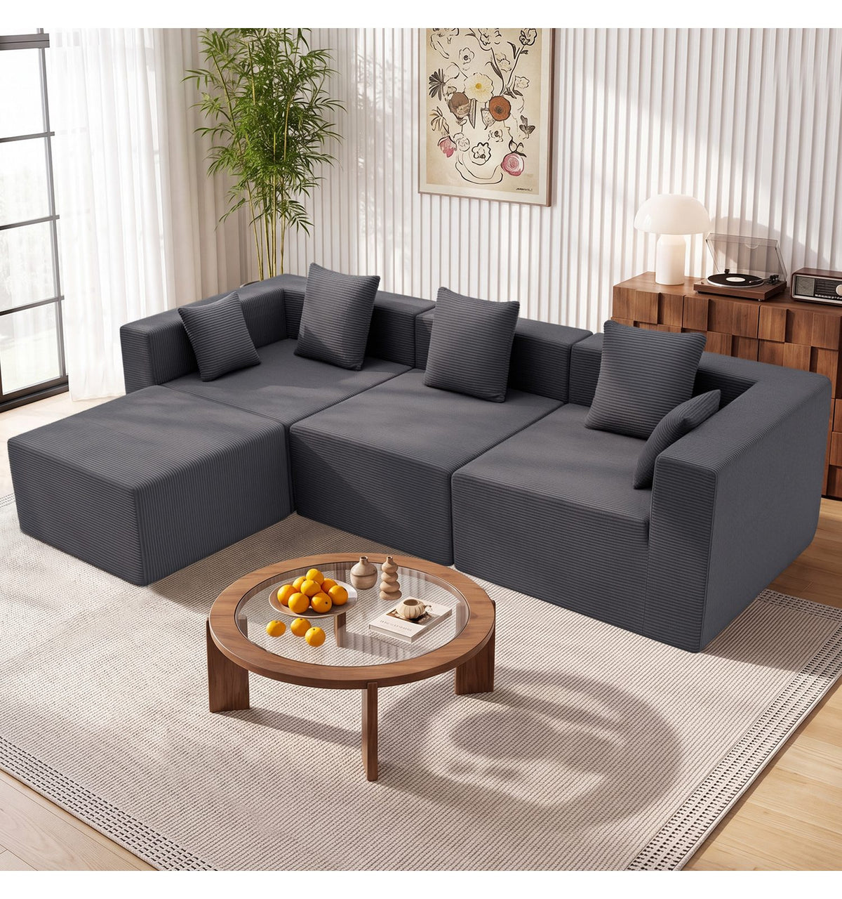 Graues Cord Ecksofa im Wohnzimmer aufgestellt
