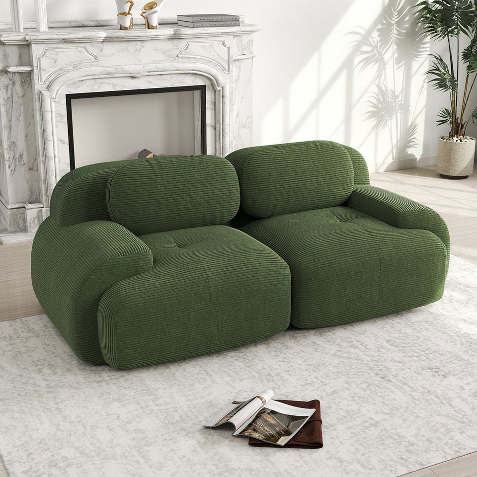Modulares Cord Sofa ODIKALO in Grün mit geschwungenen Armlehnen