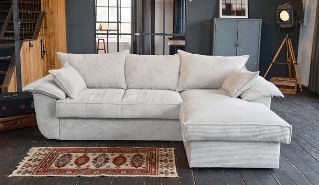 Ecksofa DAMETO aus Cord im Wohnzimmer